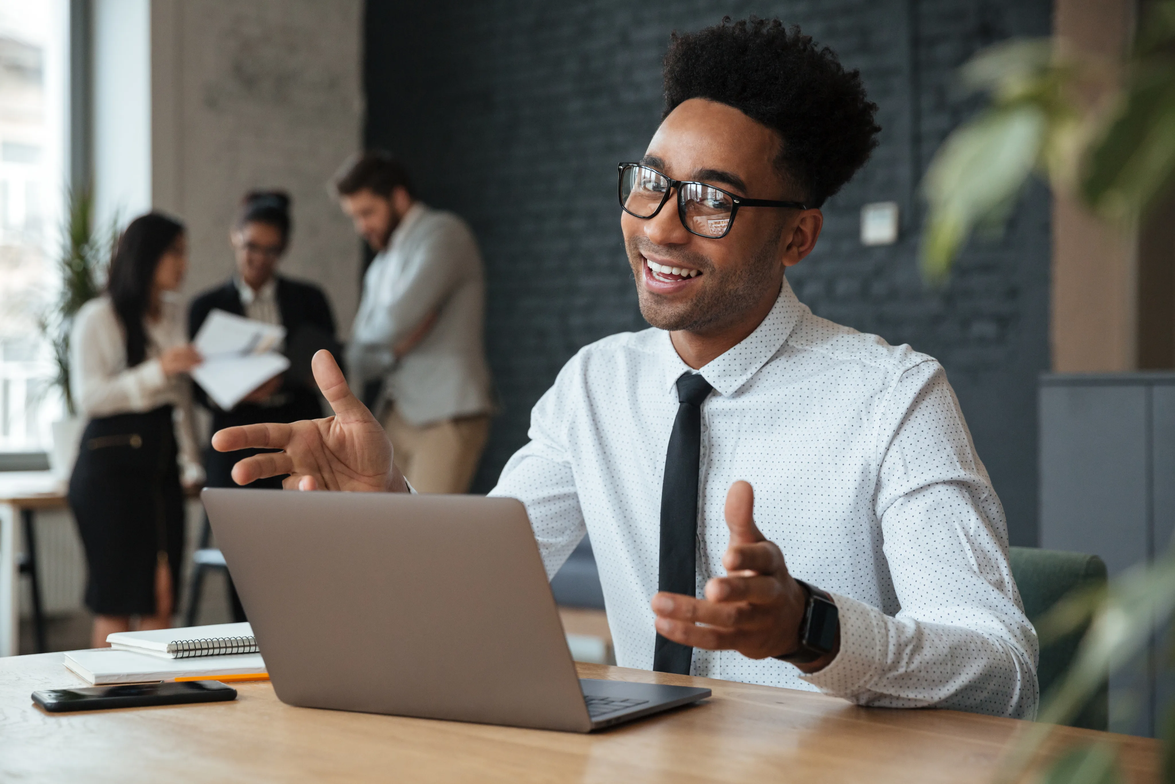Man working on PPC campaigns at laptop