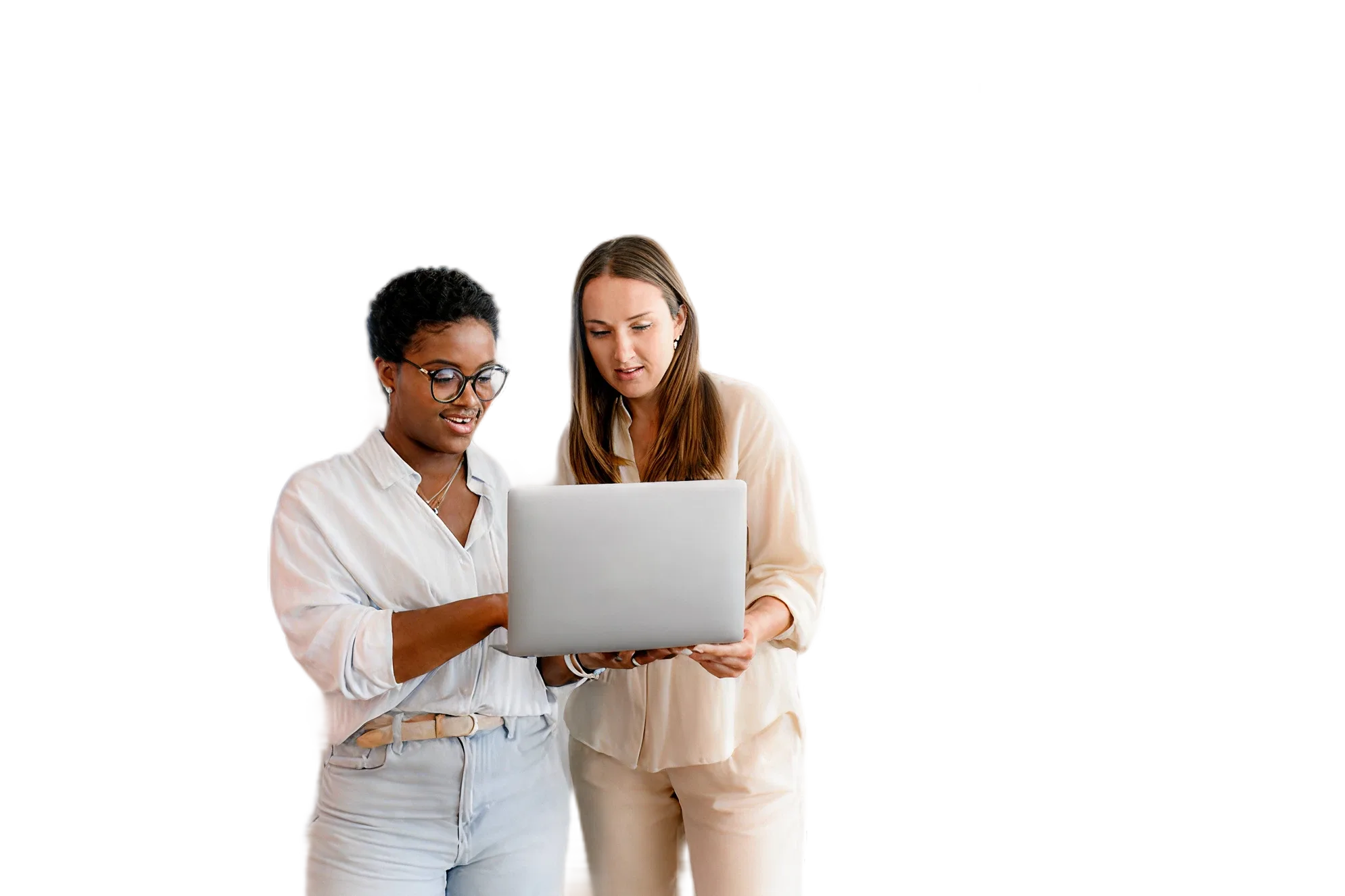 Two women looking at laptop
