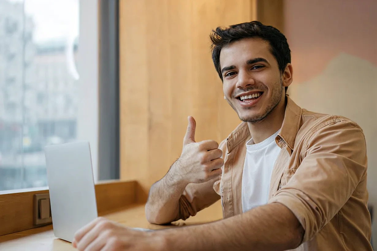 Man giving thumbs up with performance chart overlay