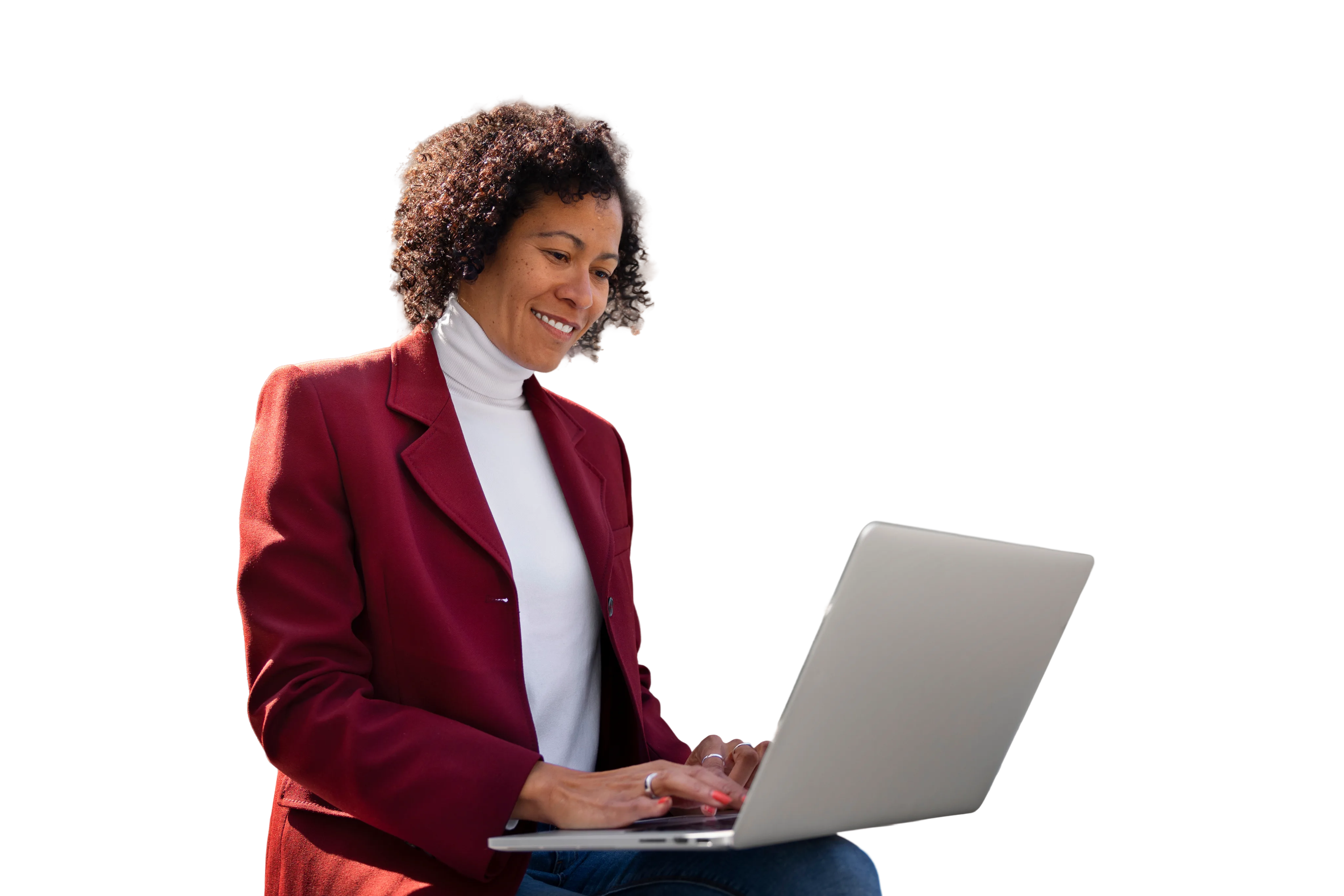 Professional using a laptop against a purple background